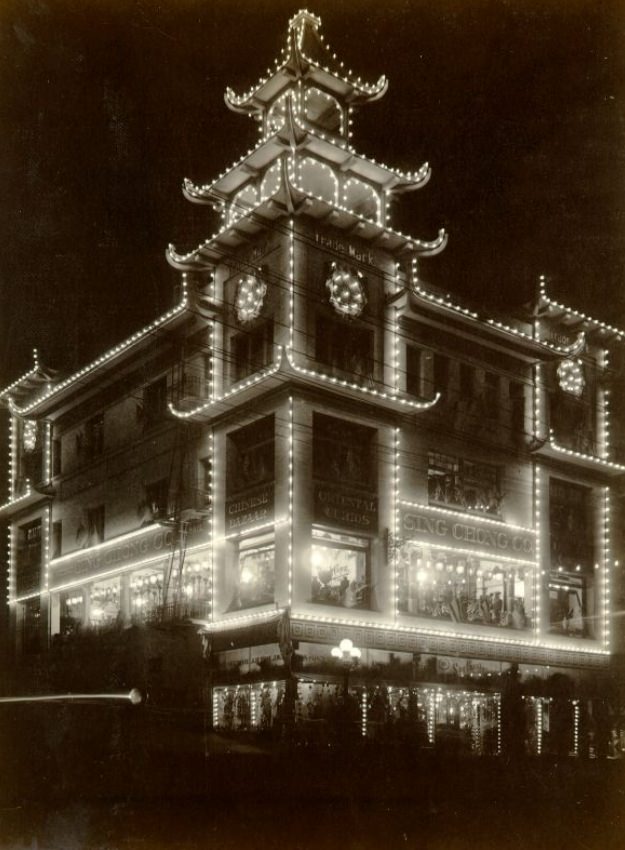 Building on Grant Avenue in Chinatown illuminated for the Portola Festival, 1909