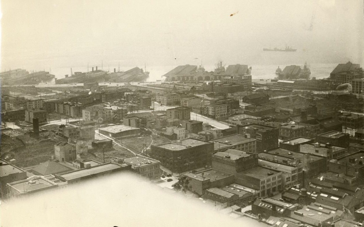 View of piers and shoreline towards the bay, 1927