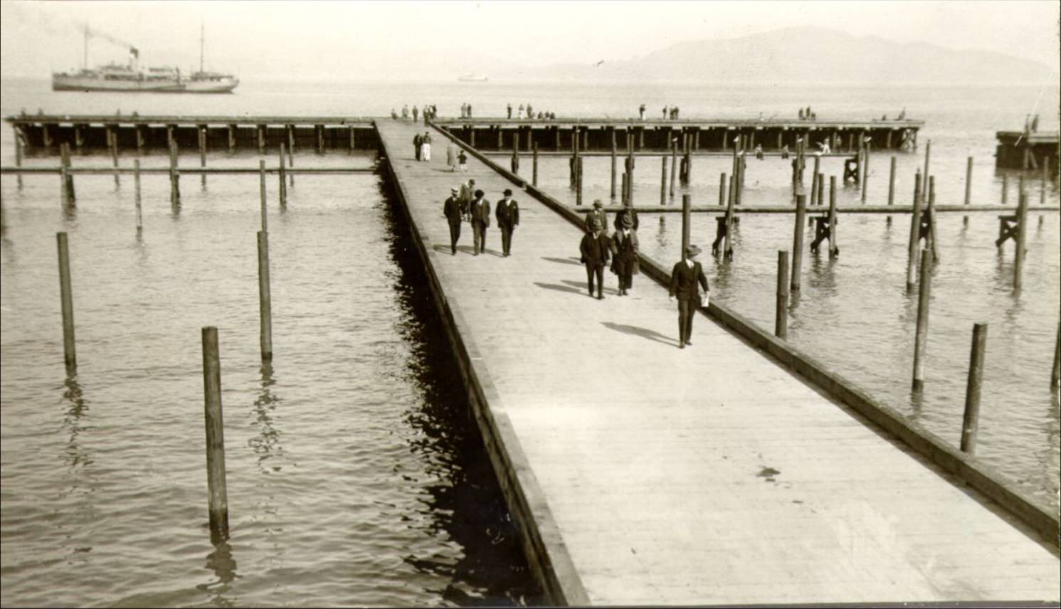Captain P. B. Lamb, Charles S. Tripler, and Mark Fontana at the Marina Yacht Harbor, 1920s