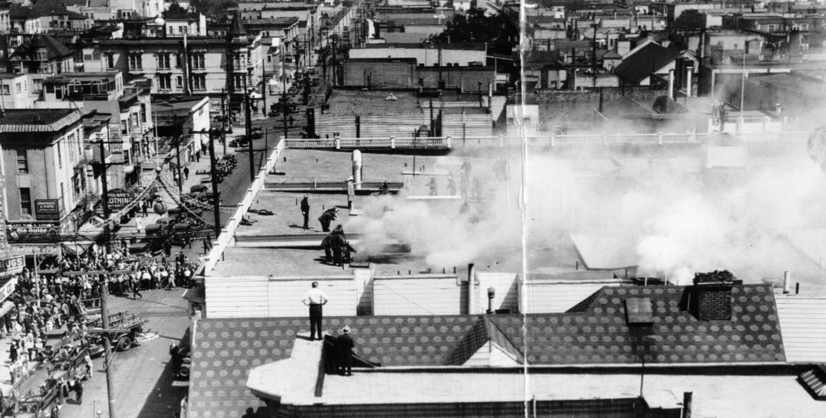 Firemen fighting a fire at the Fillmore Street Hotel, 1936