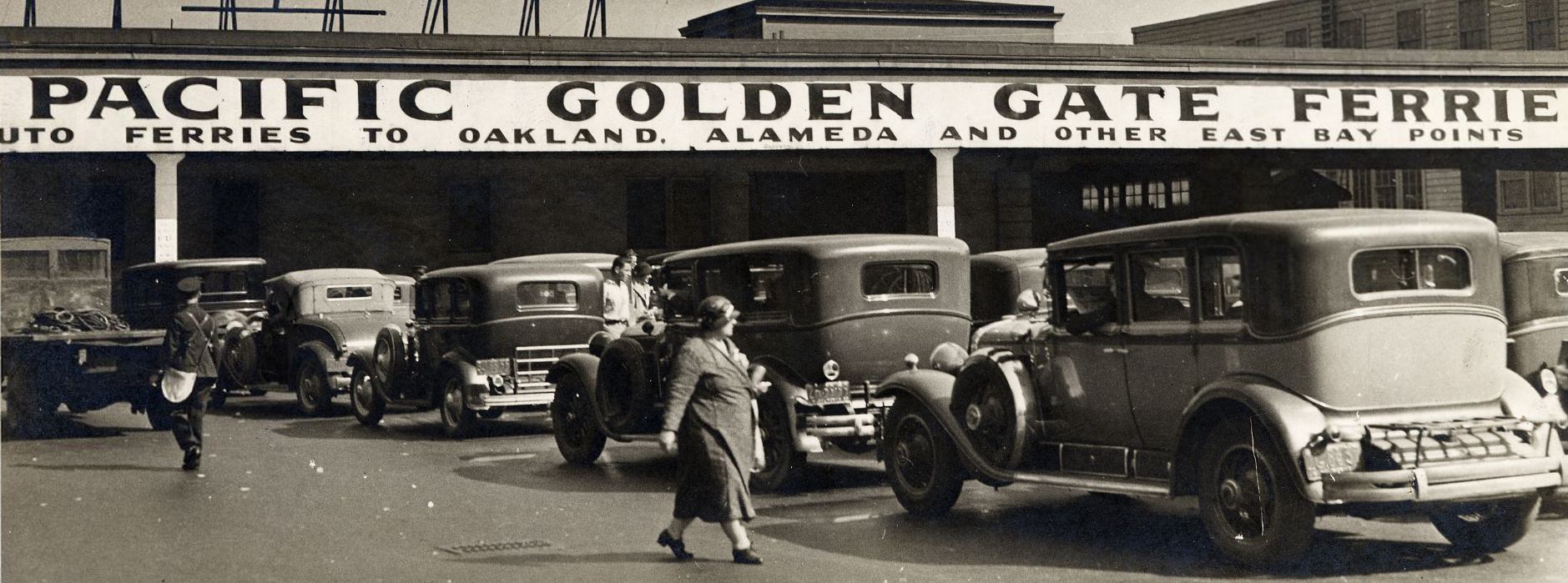 Automobiles lined up to board ferry at the Ferry Building, 1933