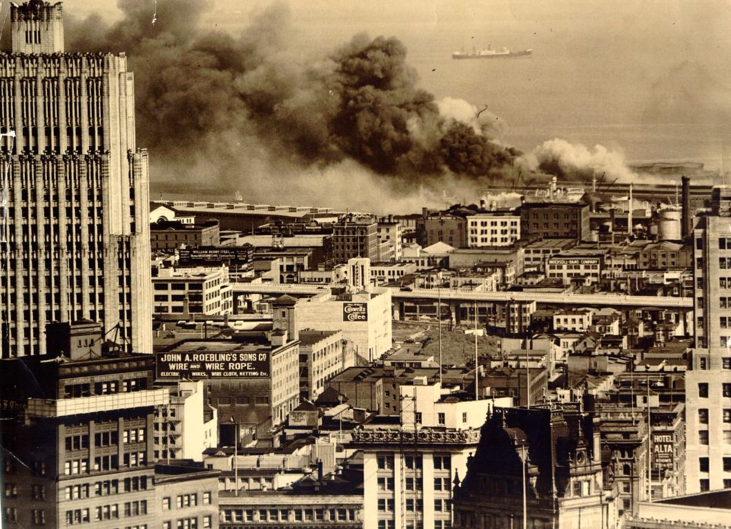 Air view of fire at San Francisco piers, 1938