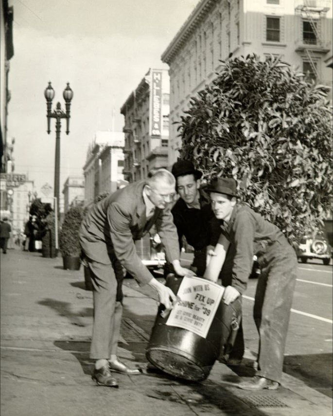 Three men carrying a tree with a planter, "Join With Us Fix Up Shine For '39'," 1938