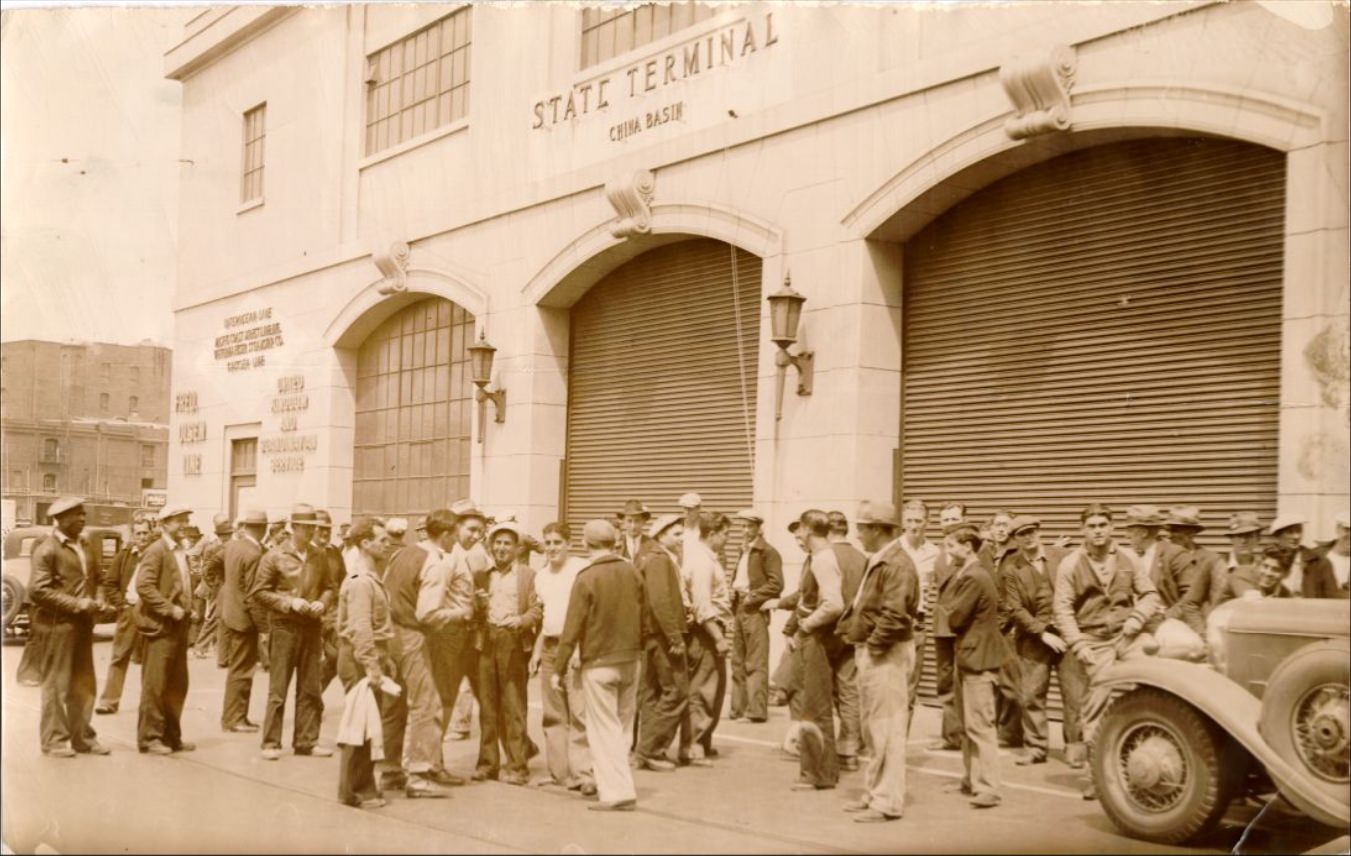 Men standing outside the State Terminal at China Basin, 1939