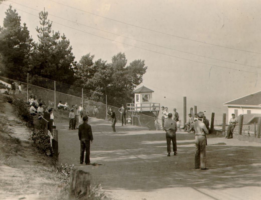 Group of immigrants playing baseball on Angel Island, 1933