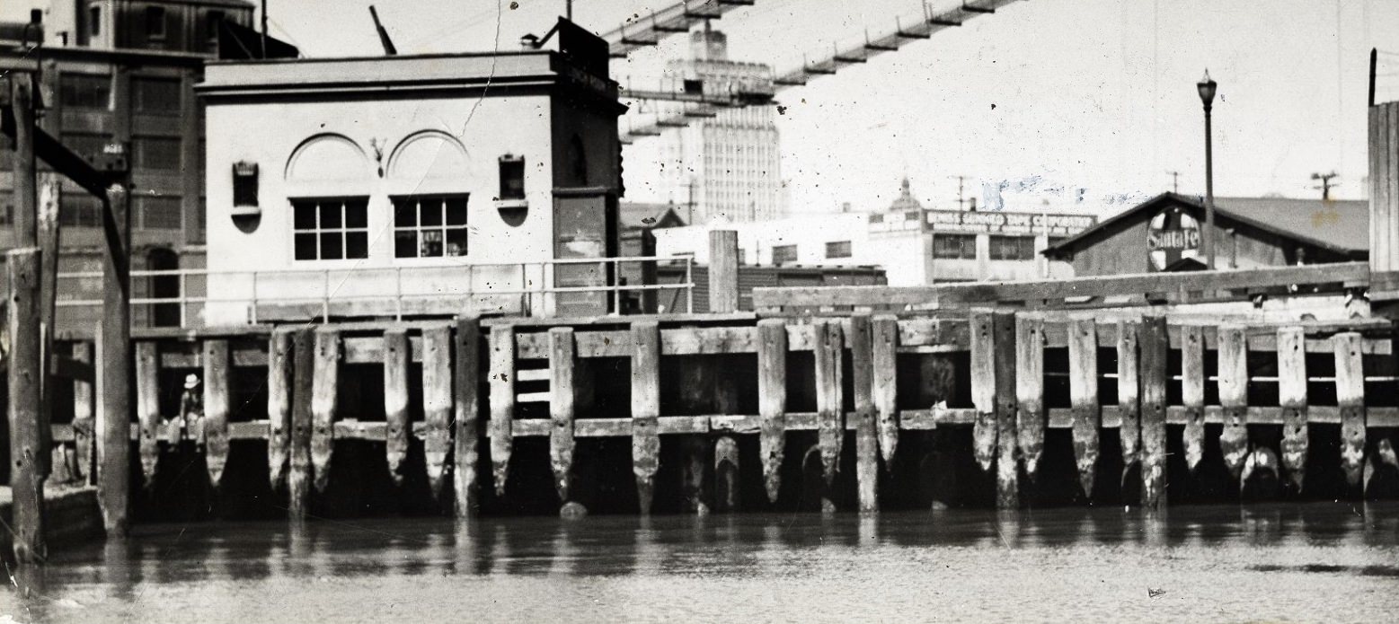 View of a rotting pier, 1935