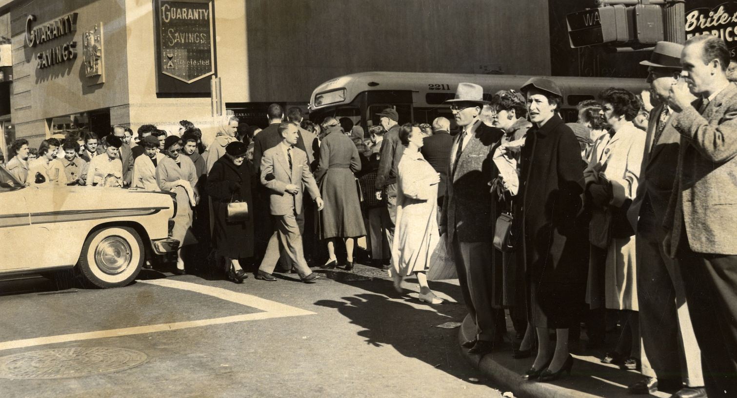 Crowd at Geary and Stockton Streets, 1957.