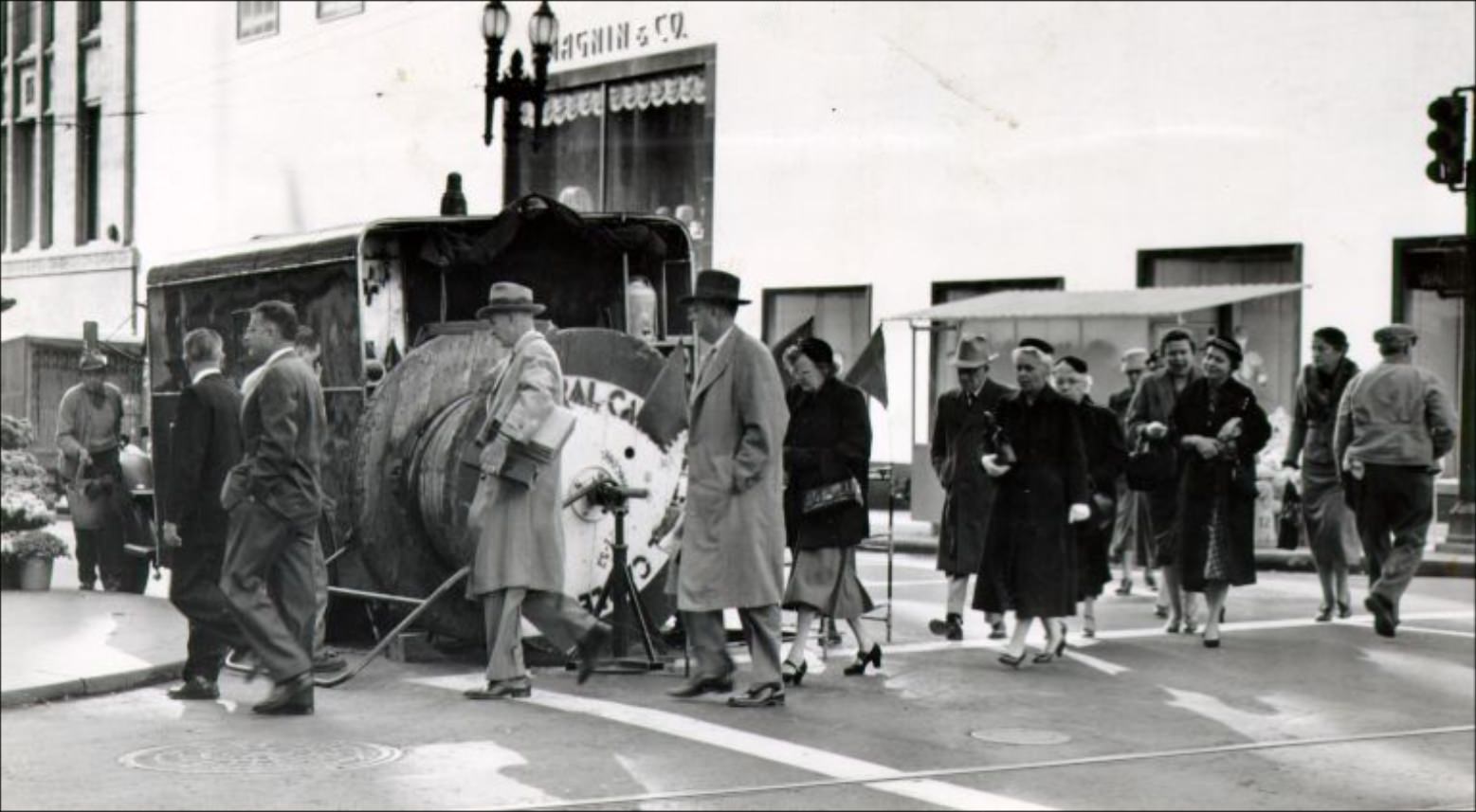 Construction on a pedestrian crosswalk at Stockton and Geary Streets, 1955.