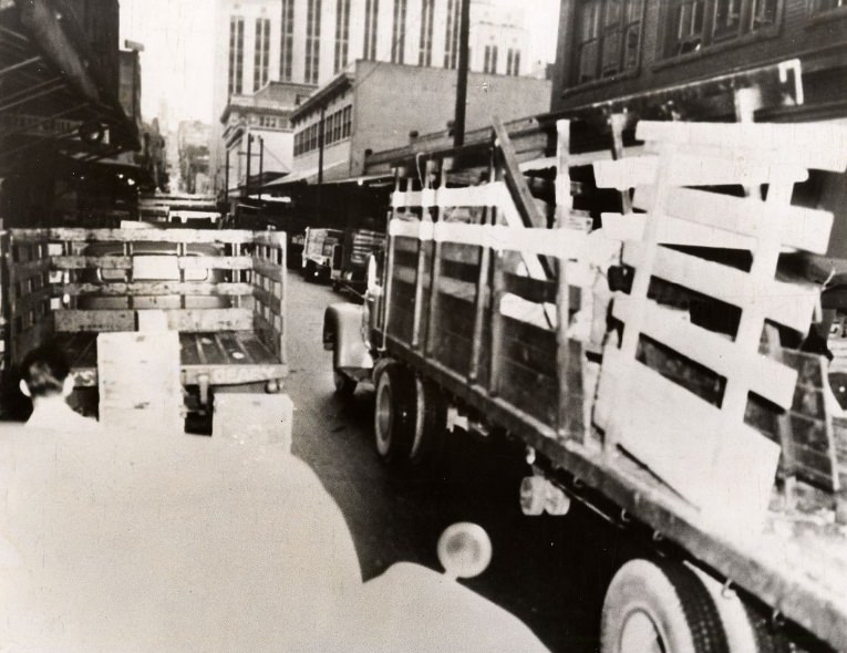 Produce delivery trucks on Washington Street, 1956.