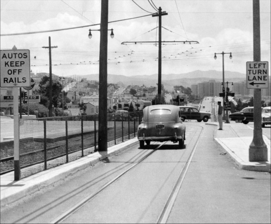 Confusing signs at Ocean Avenue and Junipero Serra Boulevard, 1953.