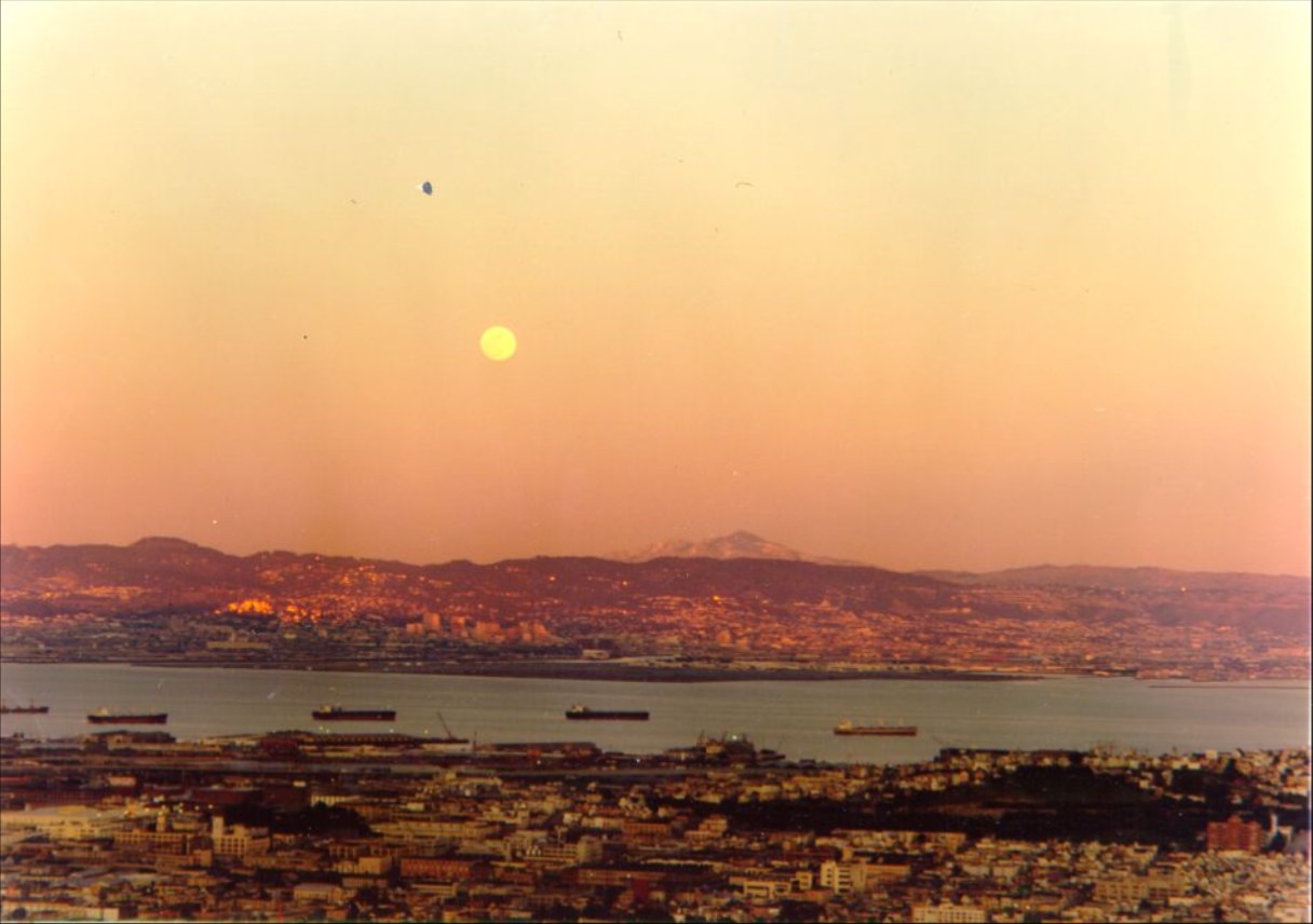 View of the east bay from Twin Peaks during sunset, 1974.