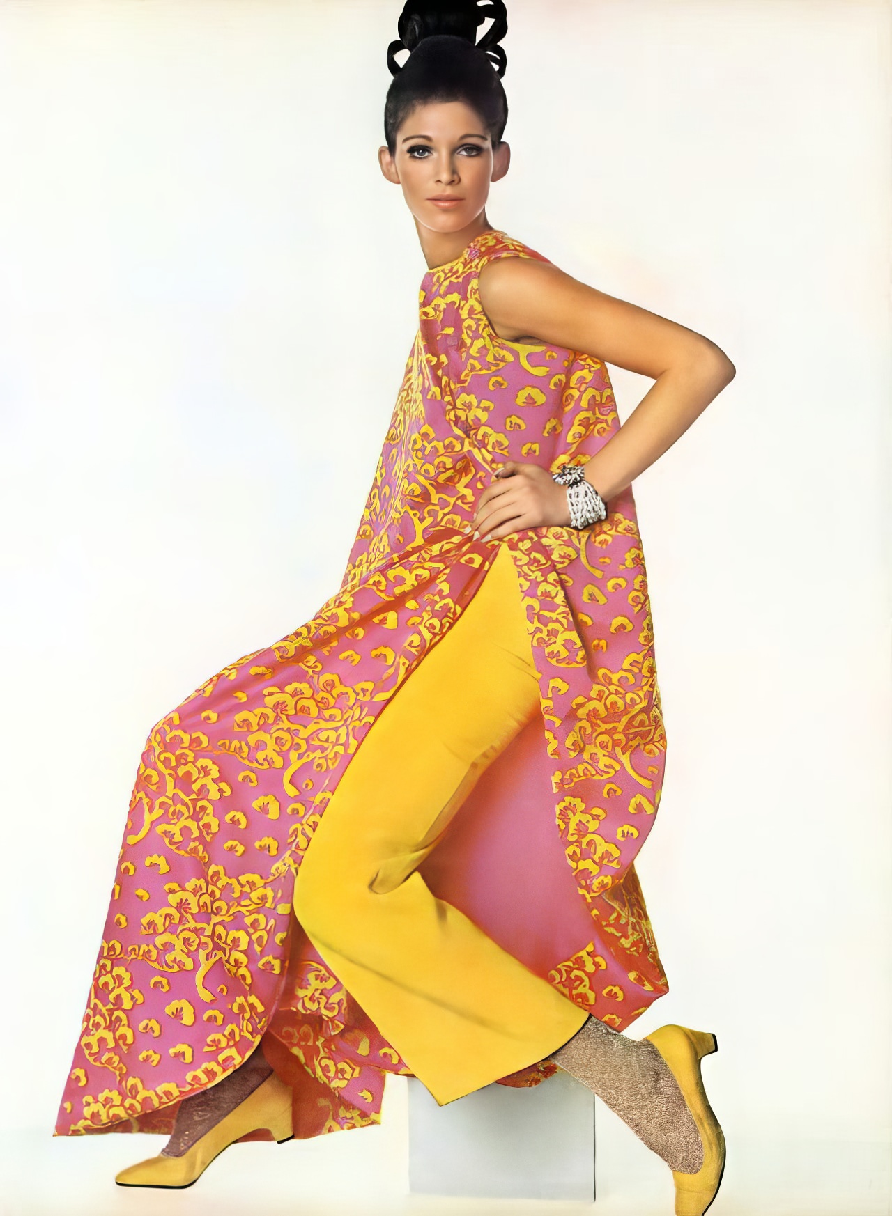 Ann Turkel in a yellow crêpe jumpsuit by Givenchy, 1967.
