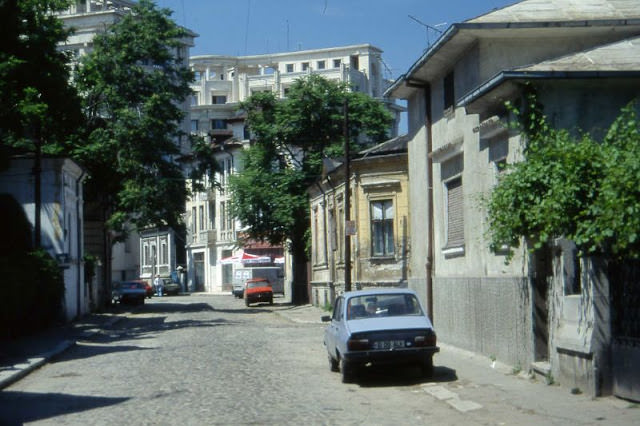 An older part of Bucharest contrasted with new developments, 1990s
