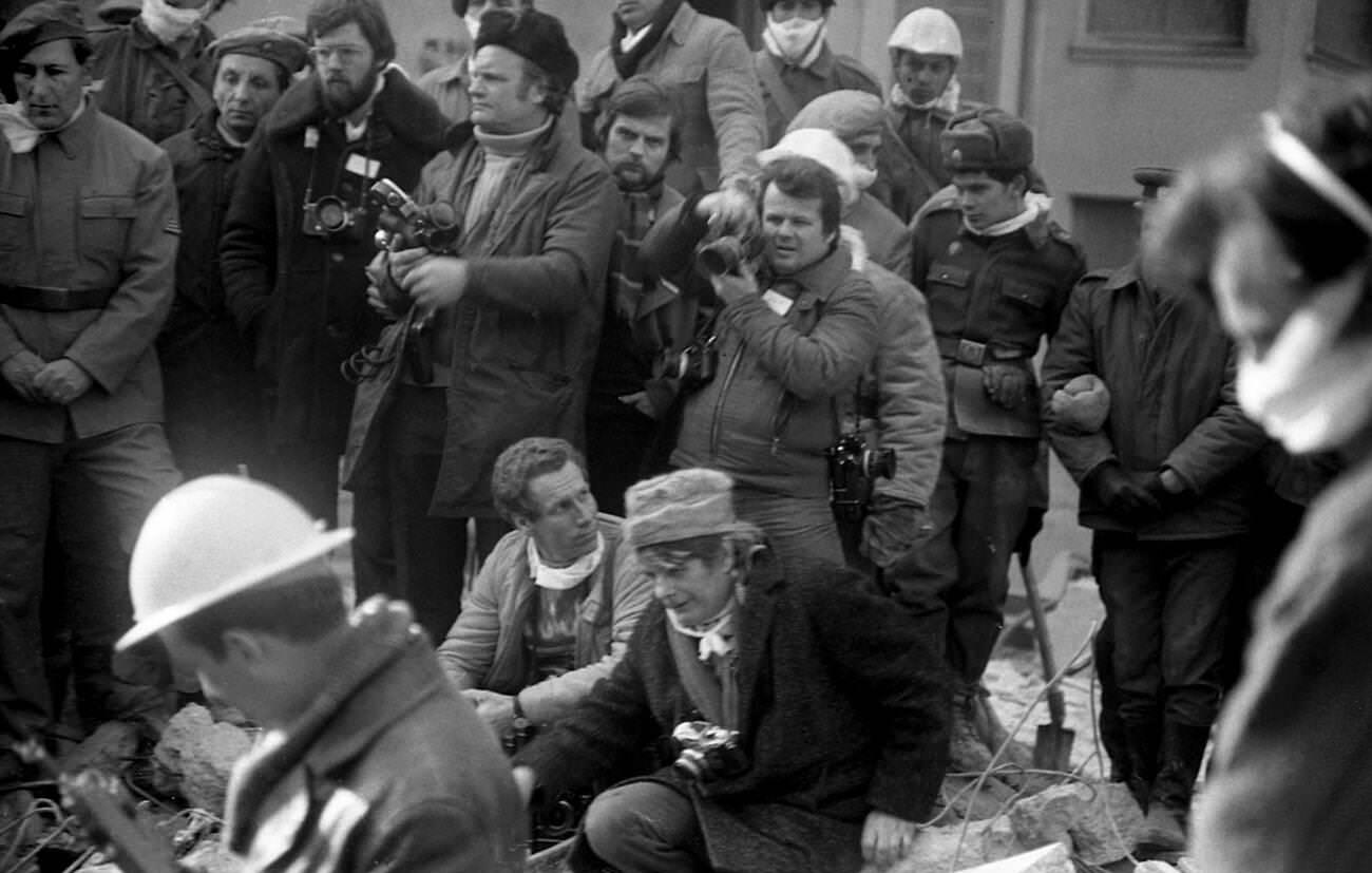 Journalists taking photos after the deadly earthquake in Bucharest, Romania, March 1977.