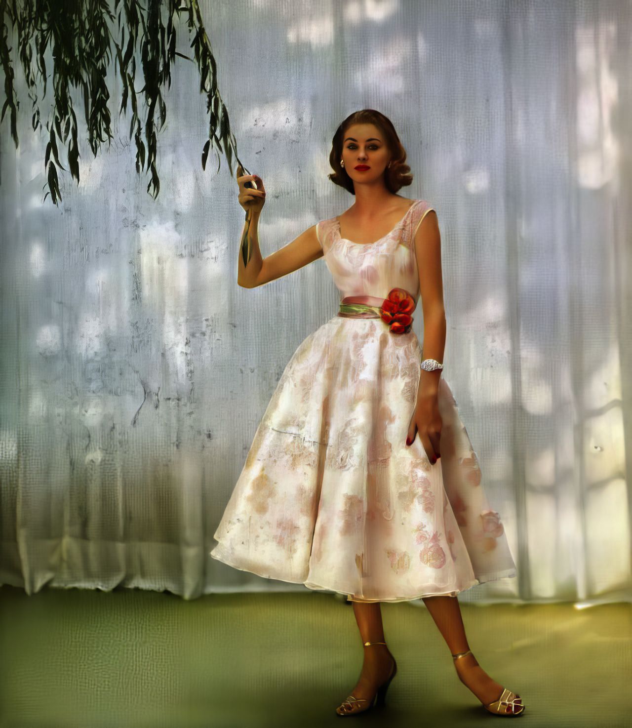 Suzy Parker in a dance dress of swirling marquisette and Enka Rayon by Harvey Berin, Harper's Bazaar, January 1952.