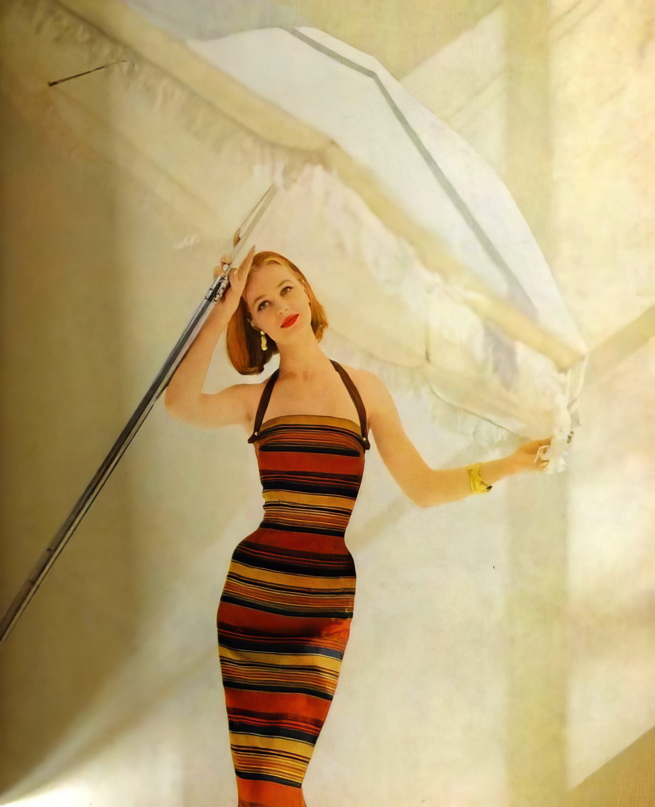 Ann Klem in a colorful striped sheath by Mr. Mort, May 1956.