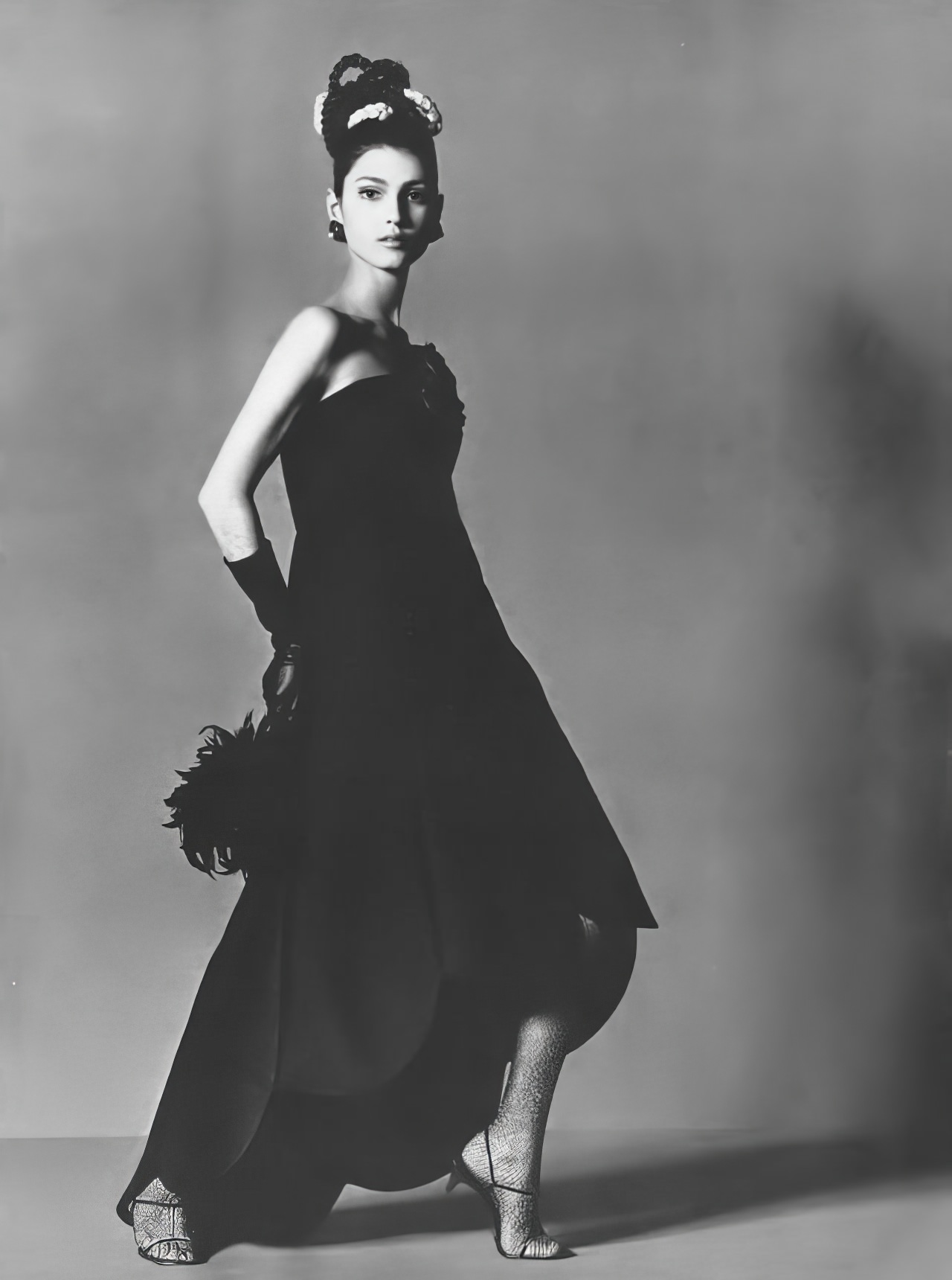 Benedetta Barzini in a black silk-and-worsted dress by Nat Kaplan, Vogue, February 1, 1967.
