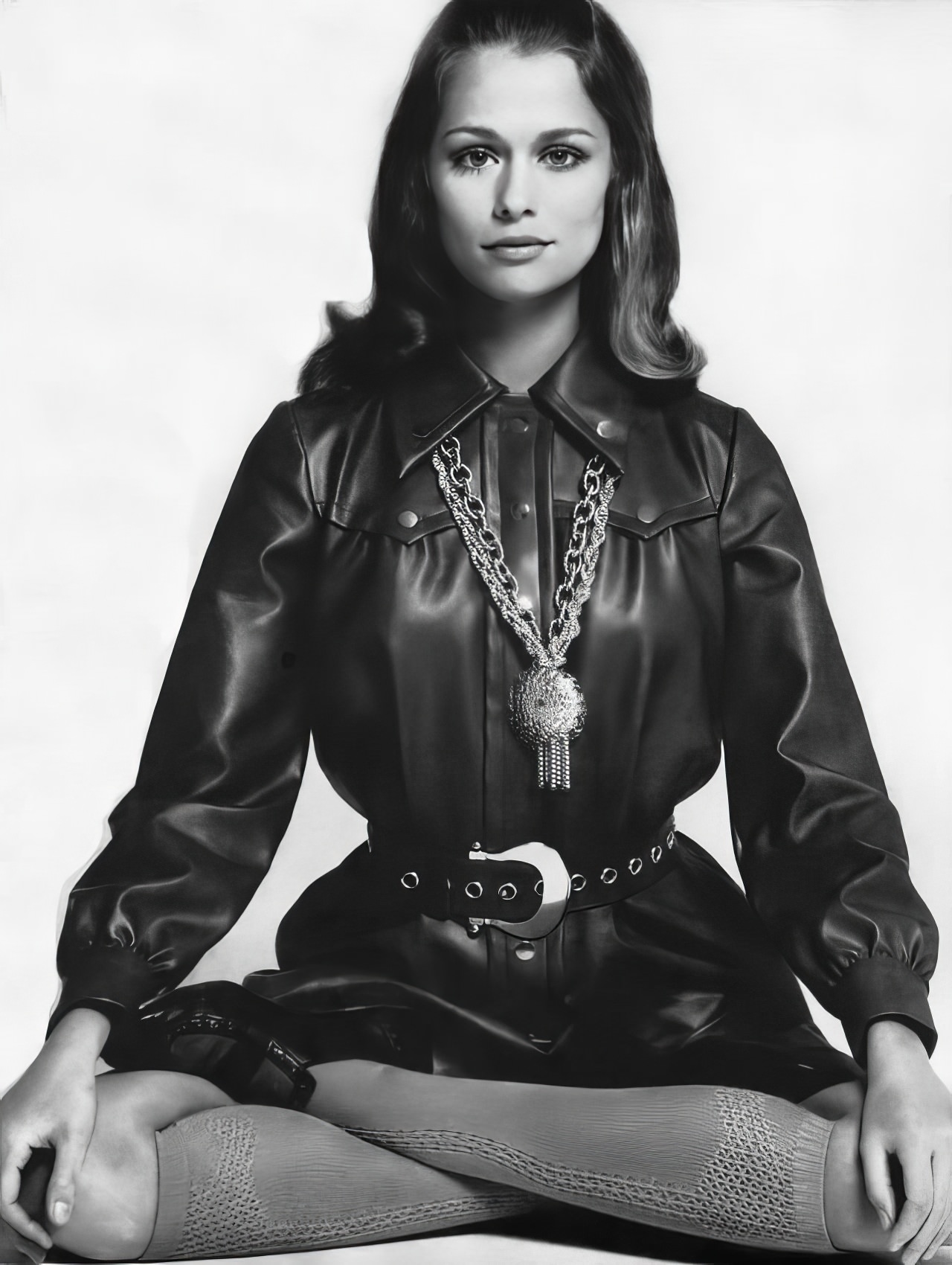 Lauren Hutton in a chestnut-brown vinyl shirtdress, Vogue, July 1, 1968.