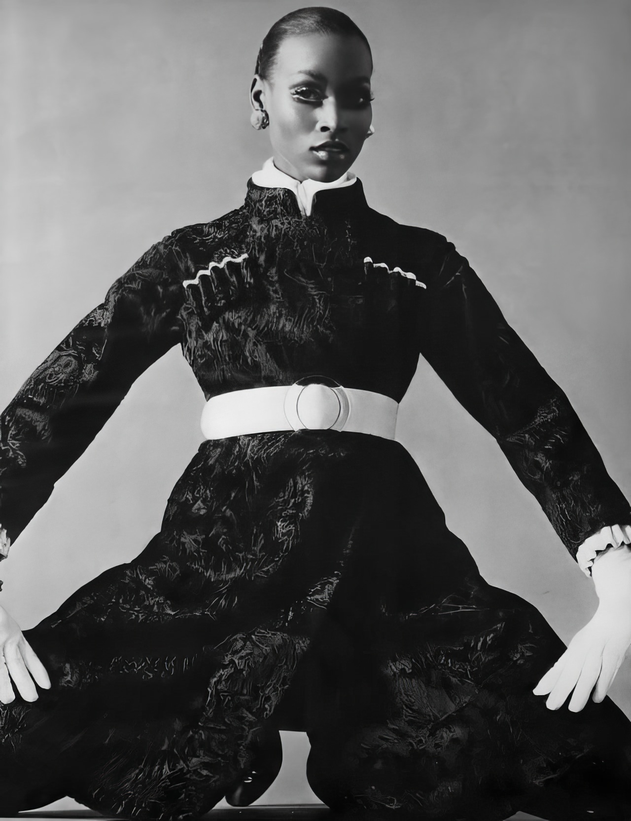 Naomi Simms in a black-dyed Russian broadtail lamb coat by Maximilian, Vogue, November 1, 1968.
