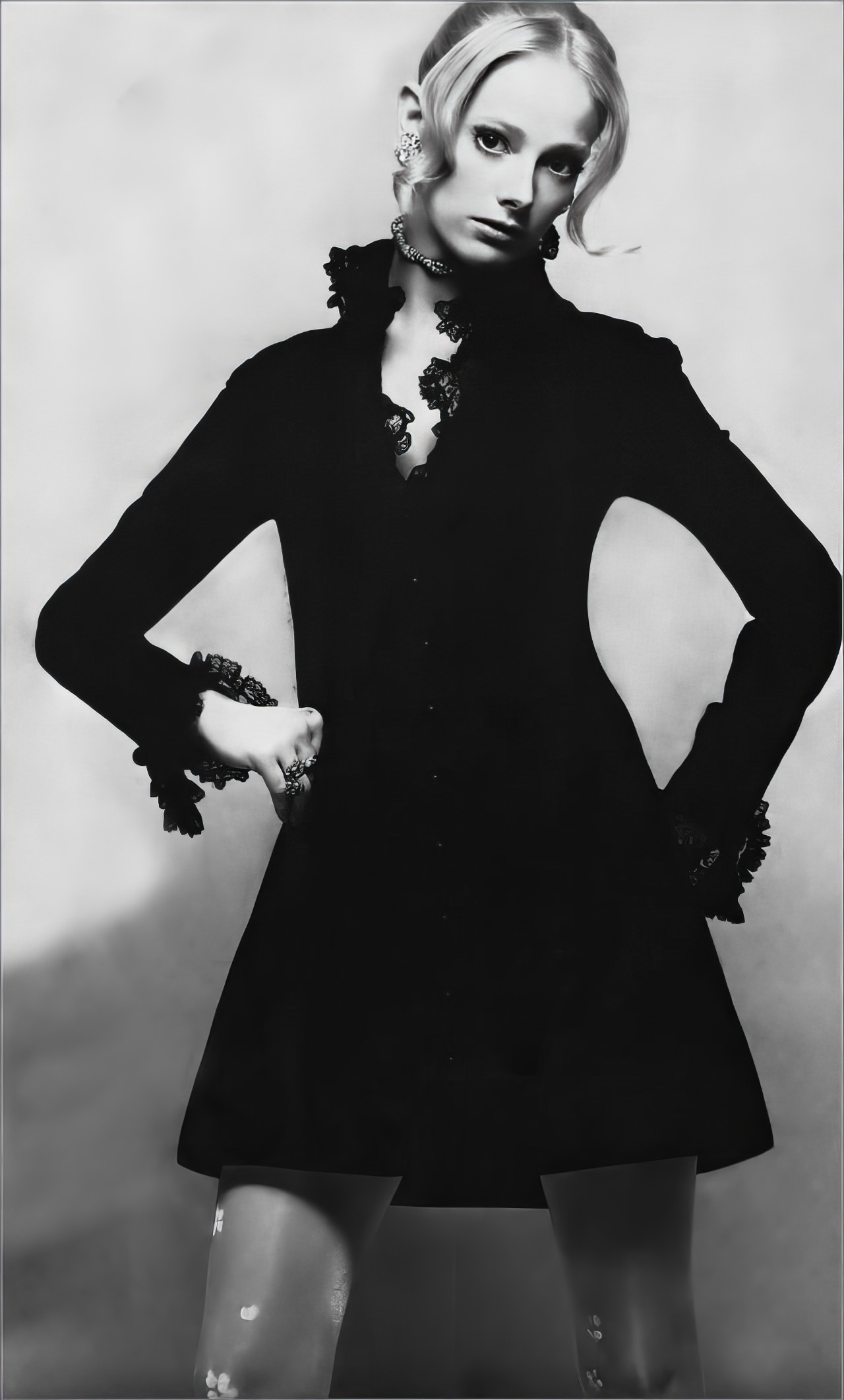Sondra Locke in a black velvet coatdress by Betty Carol for Mam'selle, Vogue, November 1, 1968.