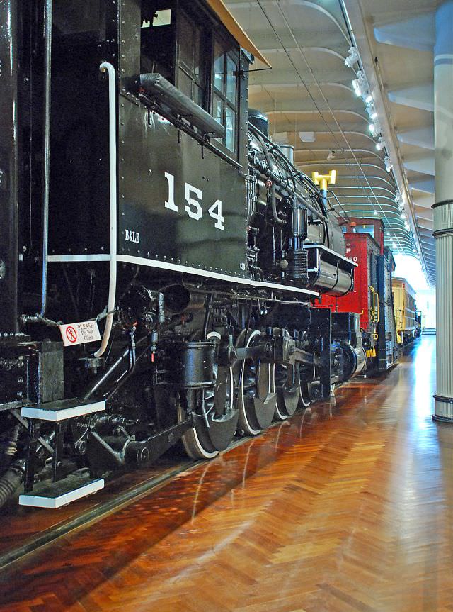 Bessemer and Lake Erie no. 154 (a 2-8-0 Consolidation) was built by the Baldwin Locomotive Works in 1909 and is now displayed in the museum's railroad exhibit