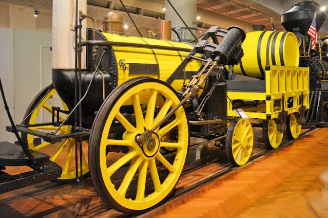 1829 Stephenson 'Rocket' at the Henry Ford Museum. Robert Stephenson built the 'Rocket' in 1829 as the winning entry in a locomotive design contest. Though quite simple in design, the locomotive attained a speed of 29 1/2 mph