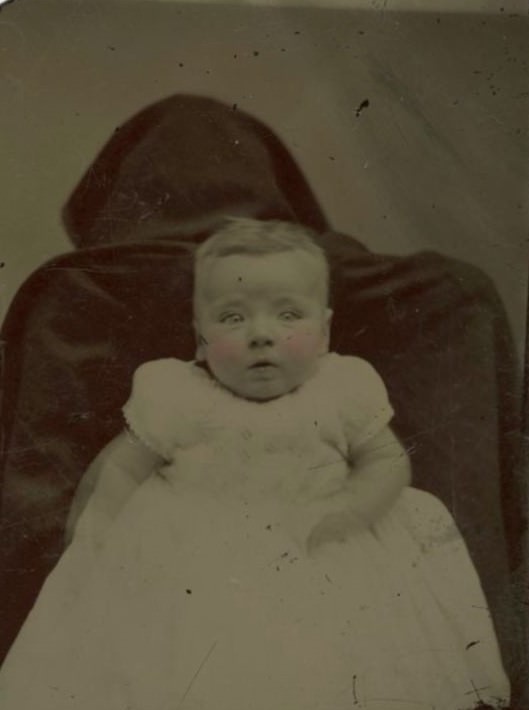 Victorian Shadows: The Spooky Phenomenon of Hidden Mothers in Historical Baby Photographs