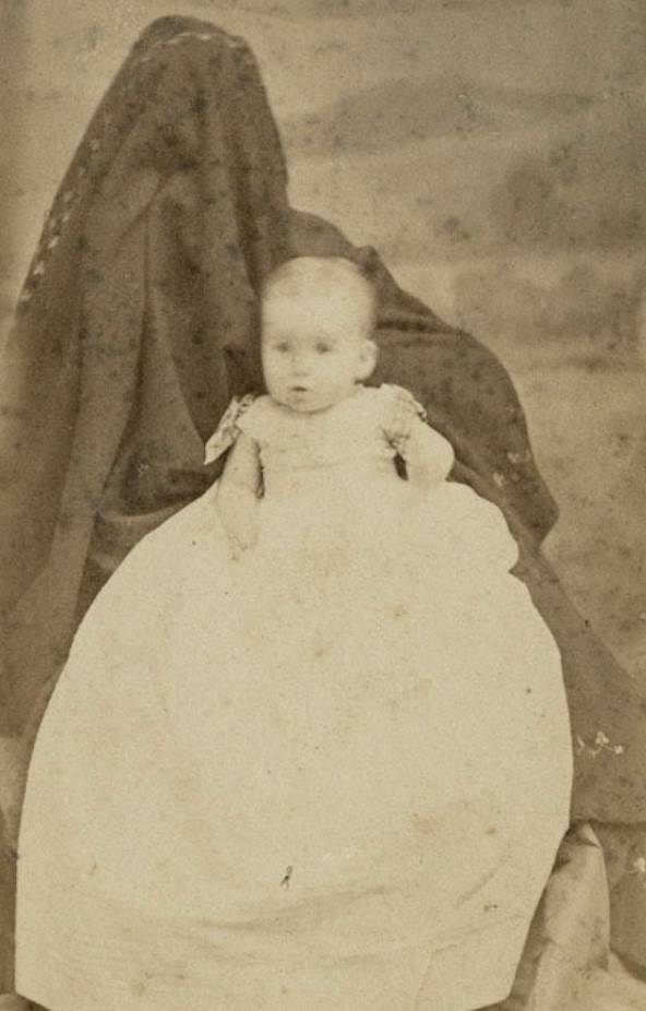 Victorian Shadows: The Spooky Phenomenon of Hidden Mothers in Historical Baby Photographs