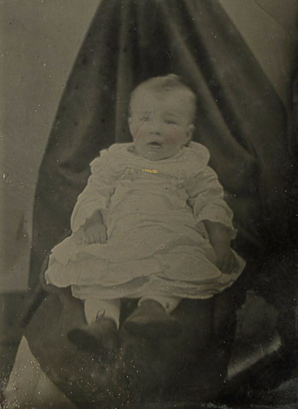 Victorian Shadows: The Spooky Phenomenon of Hidden Mothers in Historical Baby Photographs