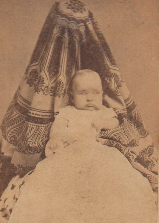 Victorian Shadows: The Spooky Phenomenon of Hidden Mothers in Historical Baby Photographs