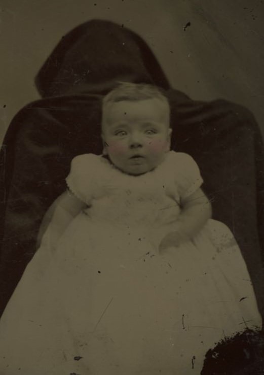 Victorian Shadows: The Spooky Phenomenon of Hidden Mothers in Historical Baby Photographs