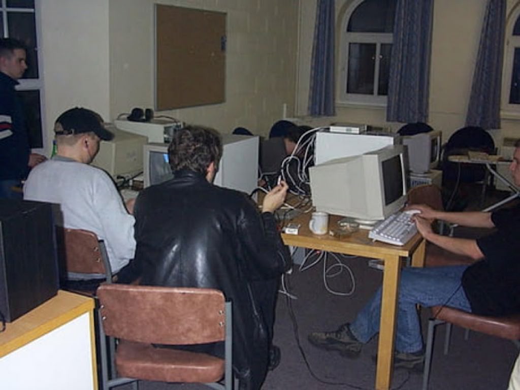 Wired Connections and Unforgettable Nights: Exploring the Peak of LAN Parties with Photos from the Late 1990s to Early 2000s