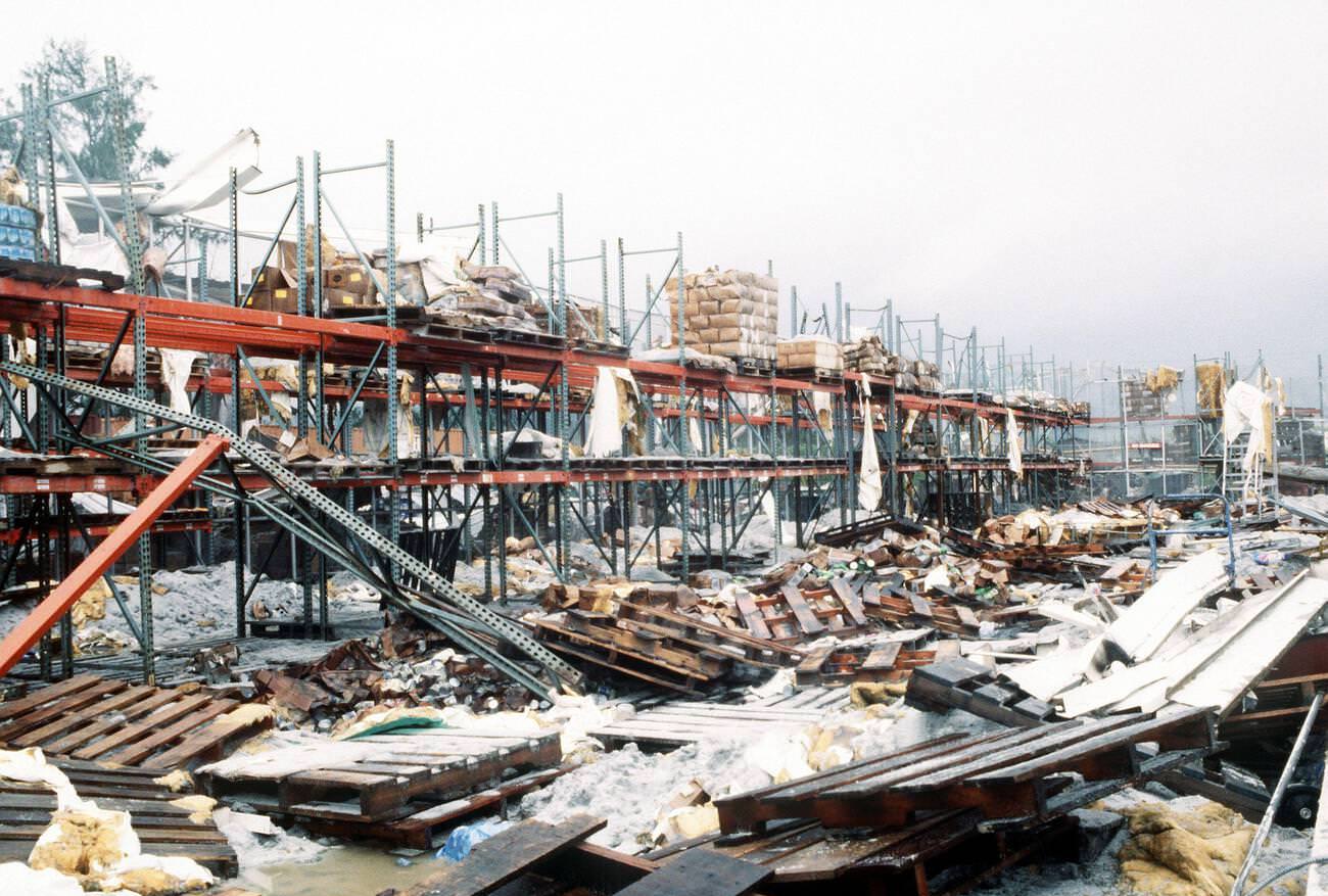 The collapsed roof of a beverage warehouse at Naval Station Subic Bay, Luzon
