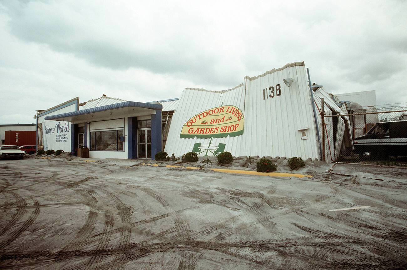 The collapsed roof of Navy Exchange's Home World, building No. 1138, at Naval Station Subic Bay