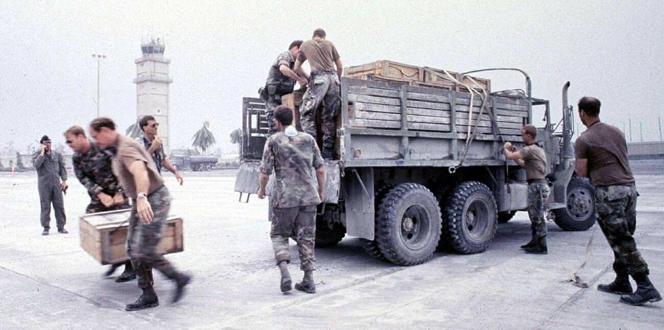 U.S. Air Force and Marine personnel evacuate ammunition during Mount Pinatubo's eruption at Clark Air Base