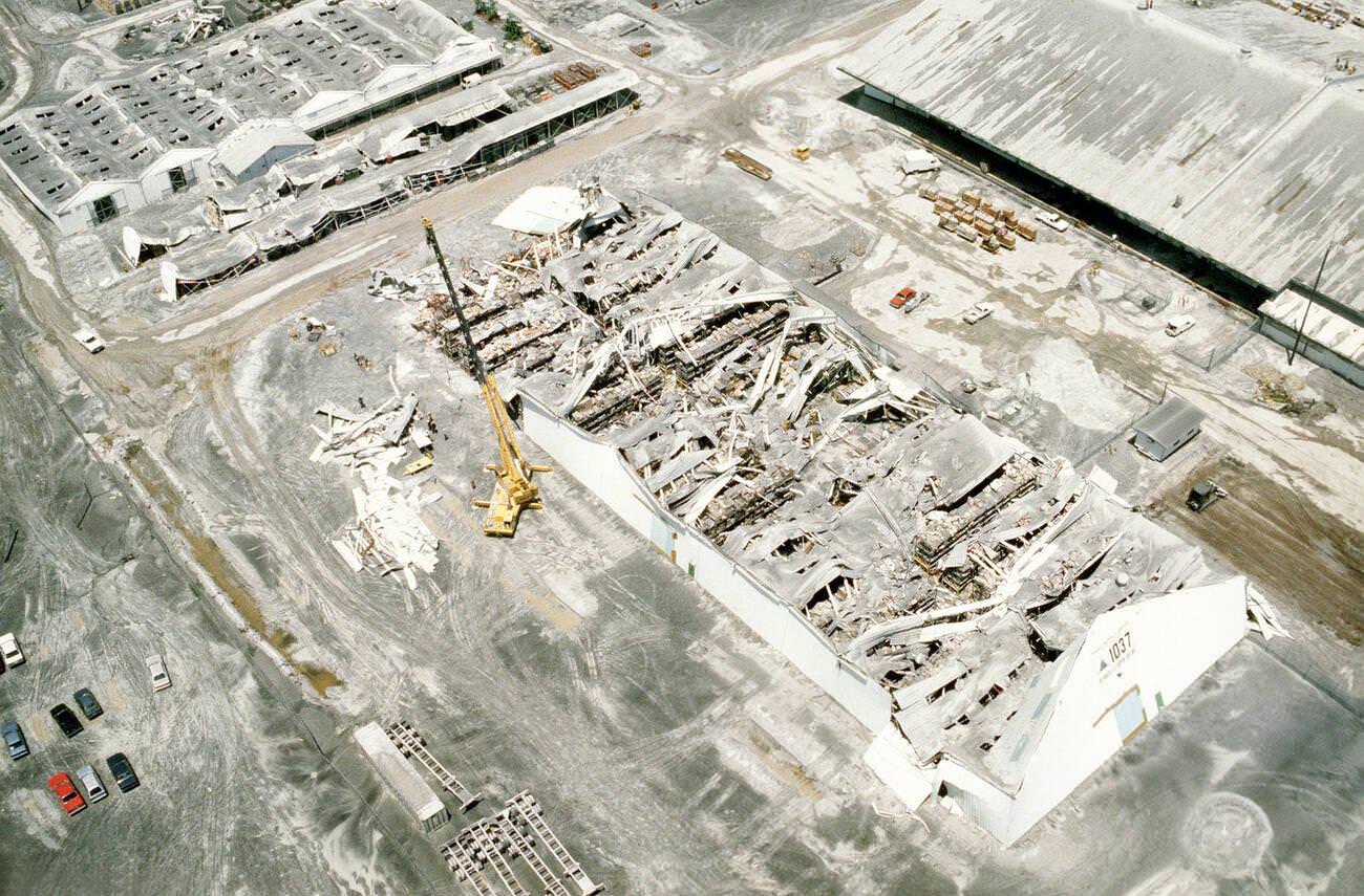 A building at NS Subic Bay, Philippines, lies in ruins under ash from Mount Pinatubo's 1991 eruption.