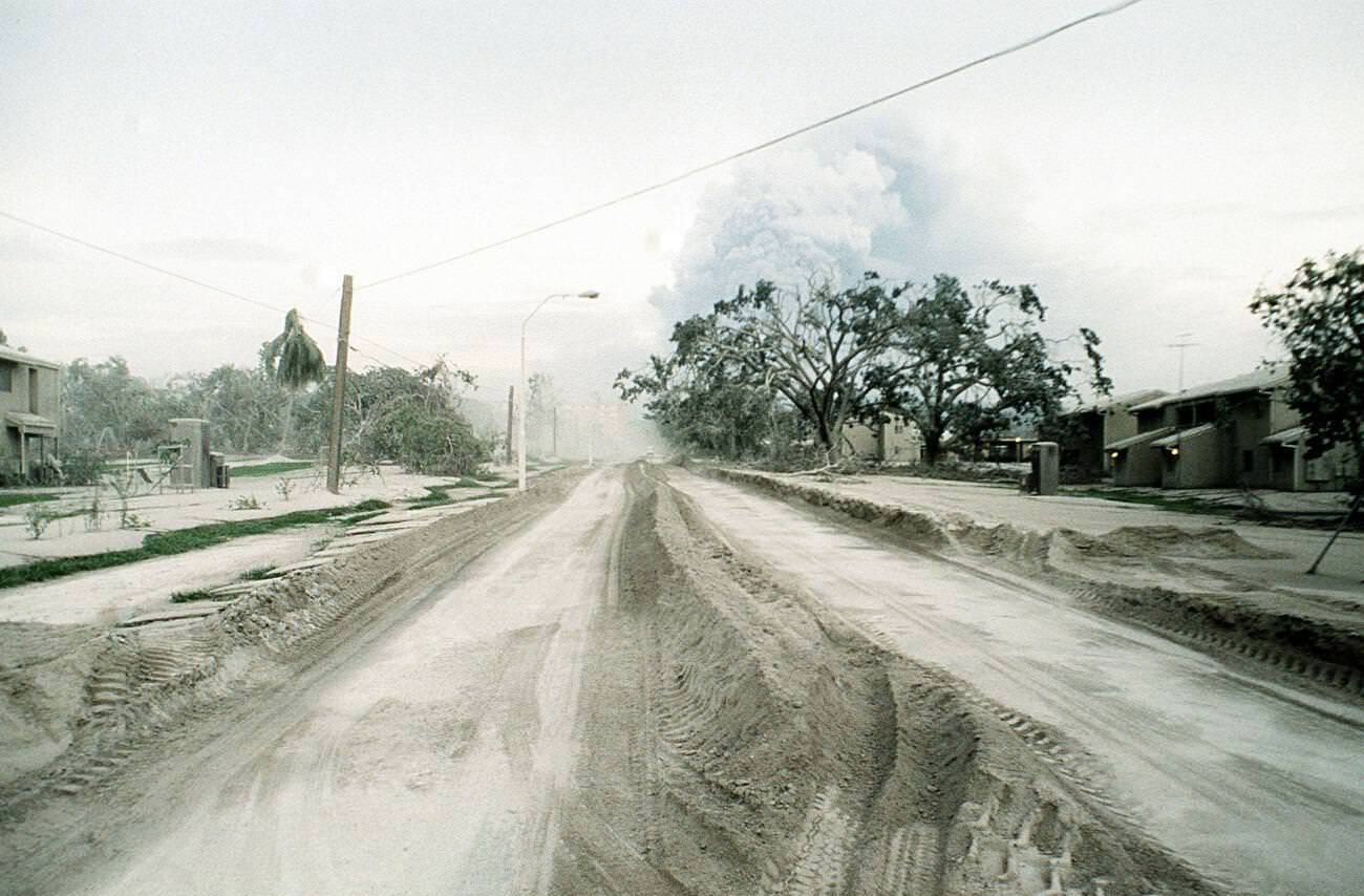 A road at Clark Air Base, Luzon, Philippines, partially cleared of volcanic ash from Mount Pinatubo's eruption.