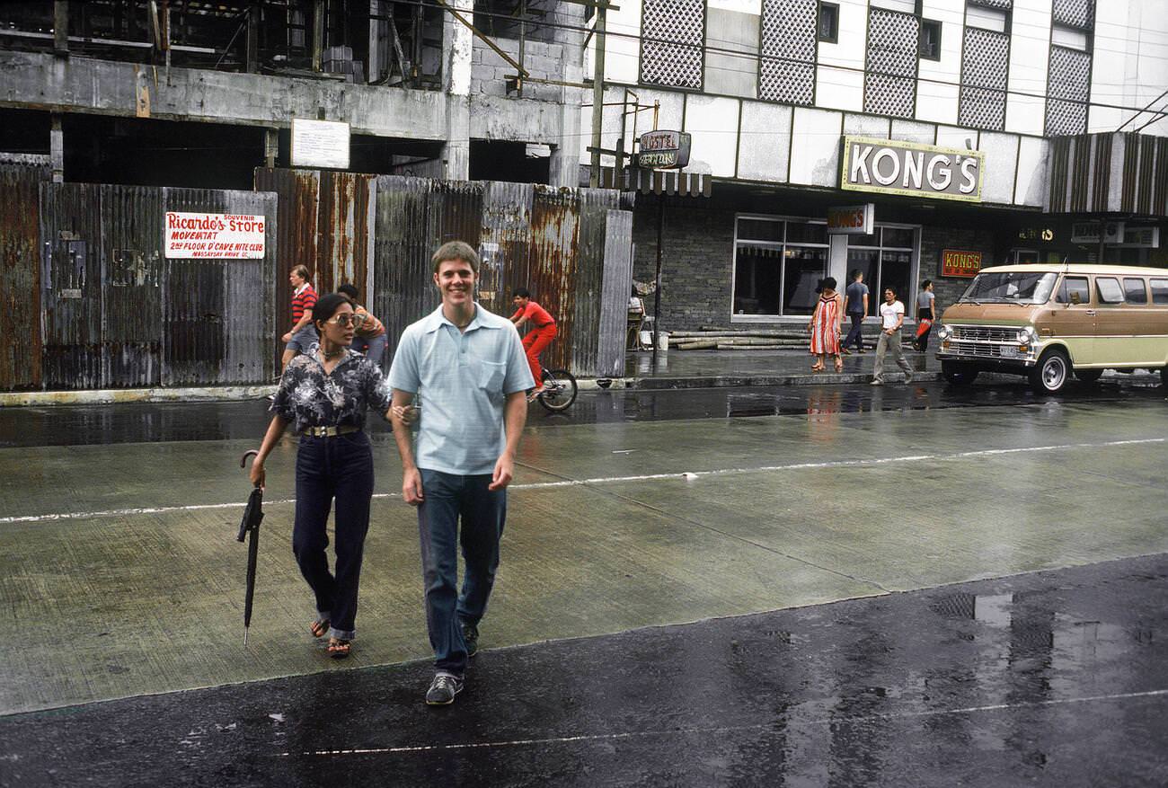 Pedestrians crossing a street in Olongapo, Luzon, Philippines, 1981.