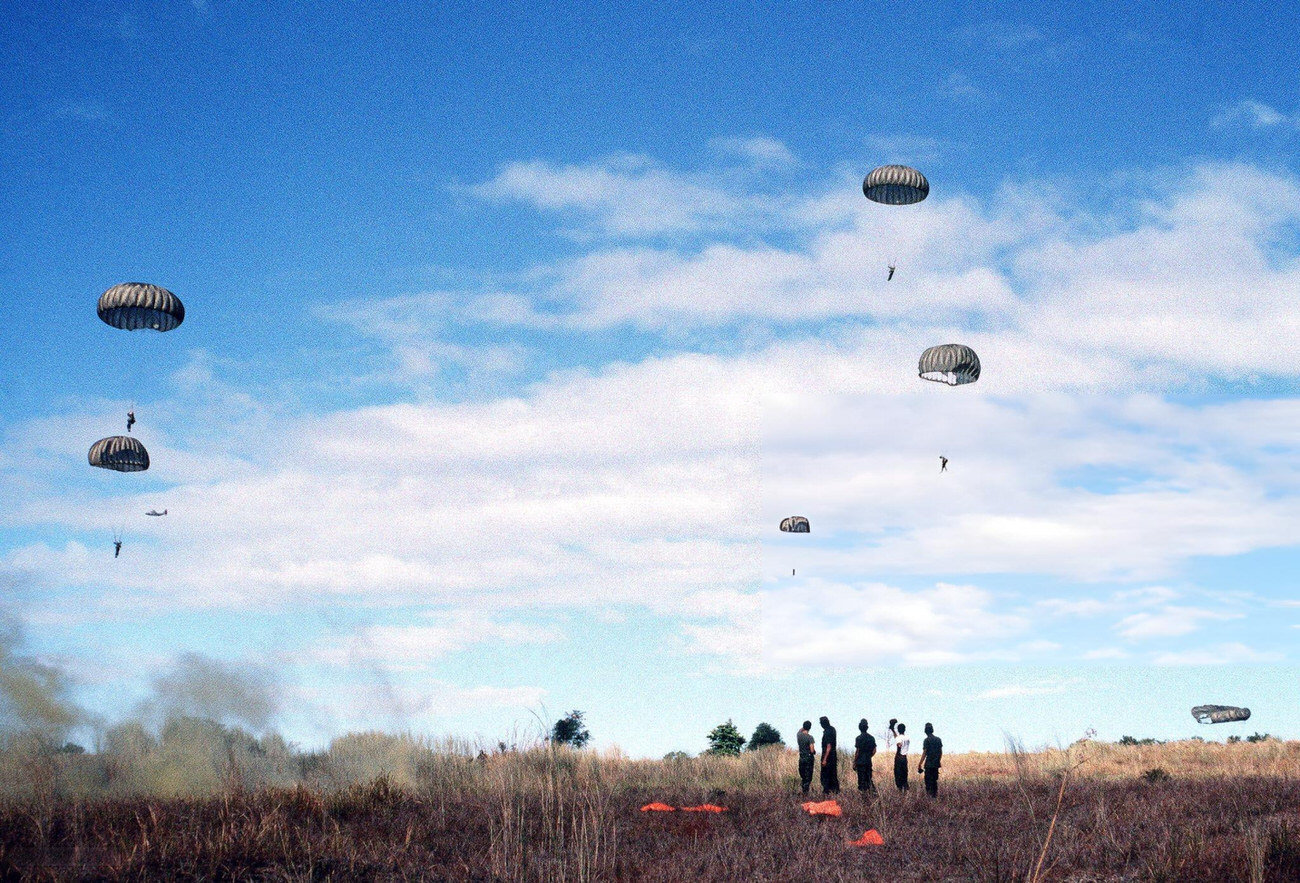 Philippine army paratroopers descend to a drop zone from a 374th Tactical Airlift Wing aircraft.