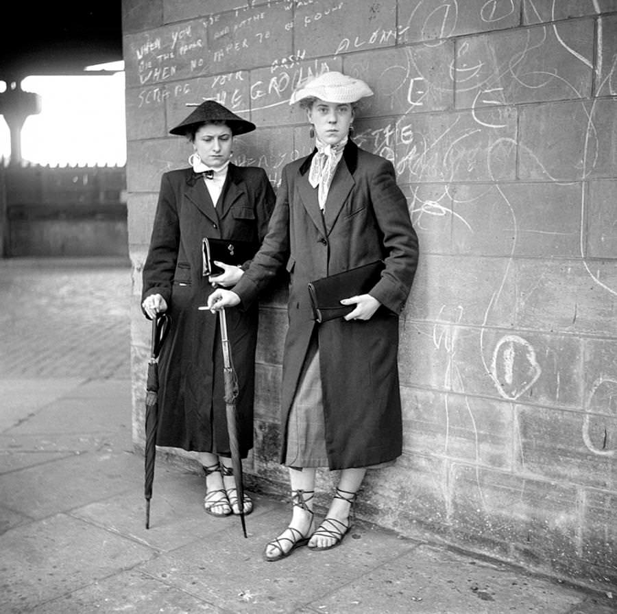 Photograph by Ken Russell January 1955 of Teddy Girls, Pat Wiles and Iris Thornton, aged 17 from Plaistow, showing off their lace up espadrilles.