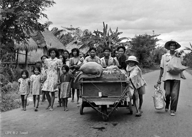 Filipino citizens fleeing the fighting, Manila, Philippines, February 1945