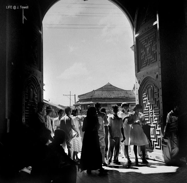 Inside Quiapo Church looking out just before the bombing and invasion by the Japanese late 1941. Manila, Philippines.