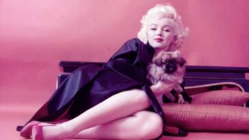 Marilyn Monroe with her dogs