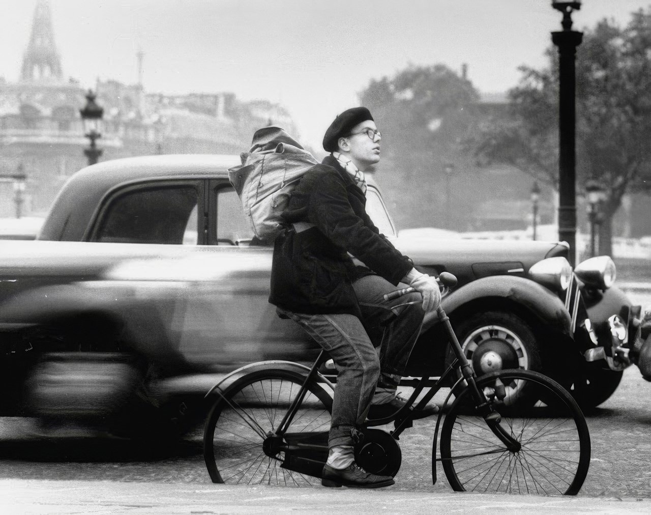French look gives Ed Perregaux, from Connecticut the reputation of being "a character." He wears a beret and pack, rides a bike which he bought at the Flea Market.
