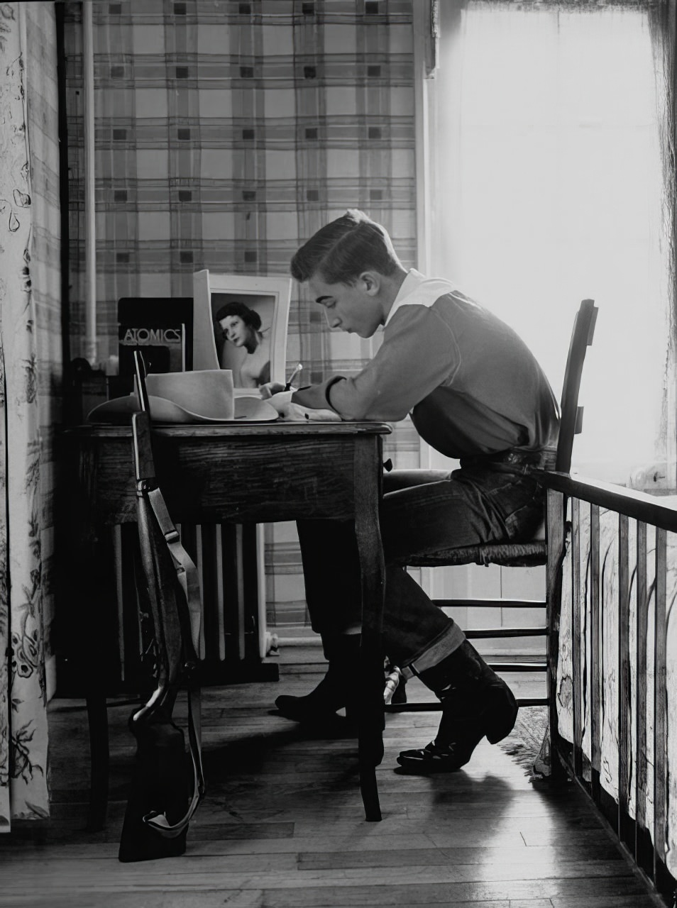 Texas look is preserved by homesick 16-year-old Earl Nesbitt of Wichita Falls, whose jeans and boots are standard apparel, whether he is in class or at home studying.