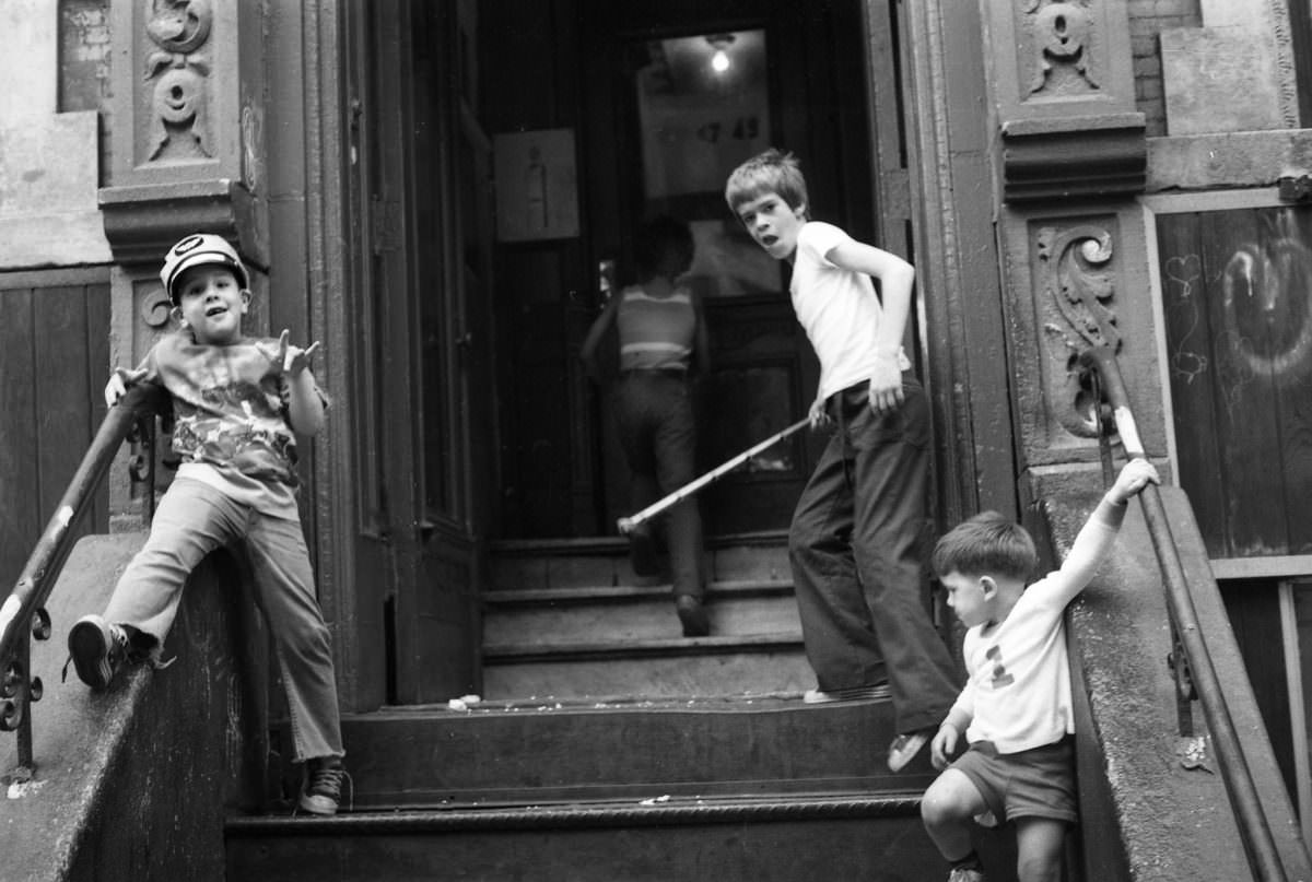 Lil Steve, Orlando, Fernando, and someone on East 3rd Street, 1975.