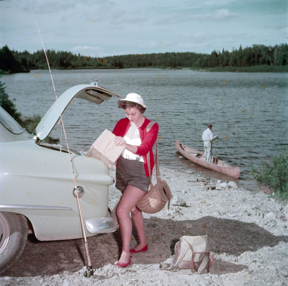 Shirley Emerson of Saint John, New Brunswick, lines up her gear to go fishing with her father, R.B. Emerson