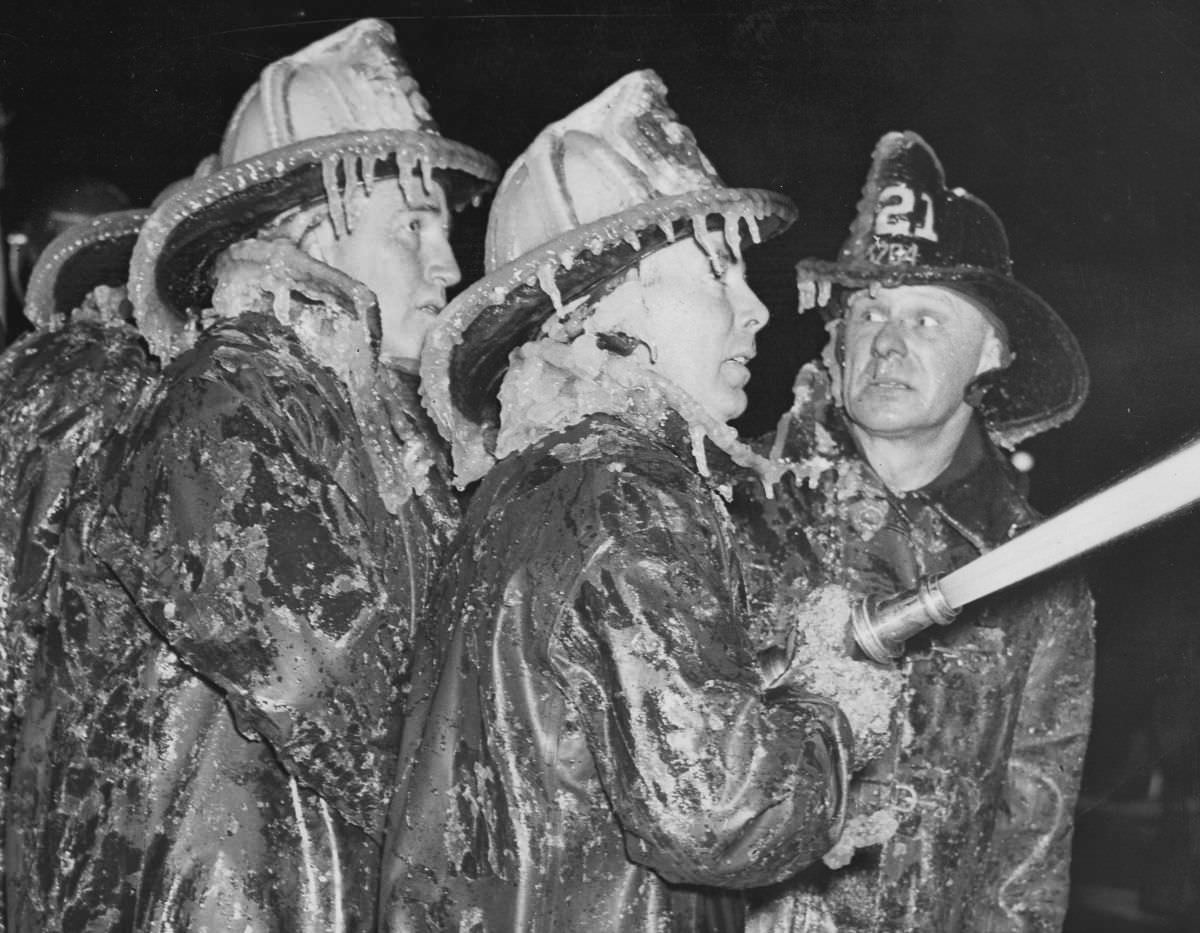 Ice-covered firemen at a Coney Island New Year's Eve fire, 1940.