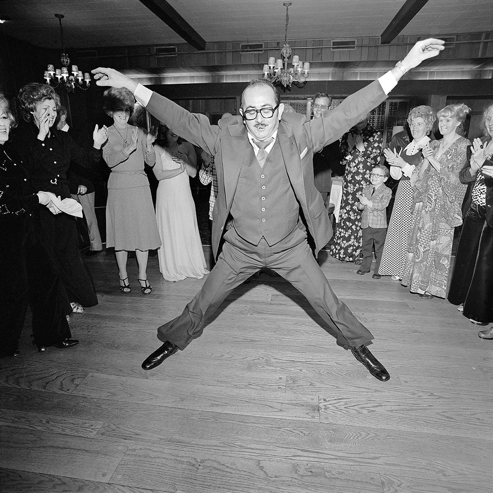 Meryl Meisler Man in a 3 Piece Suit Dancing Within the Circle at a Wedding, Rockville Centre, 1976