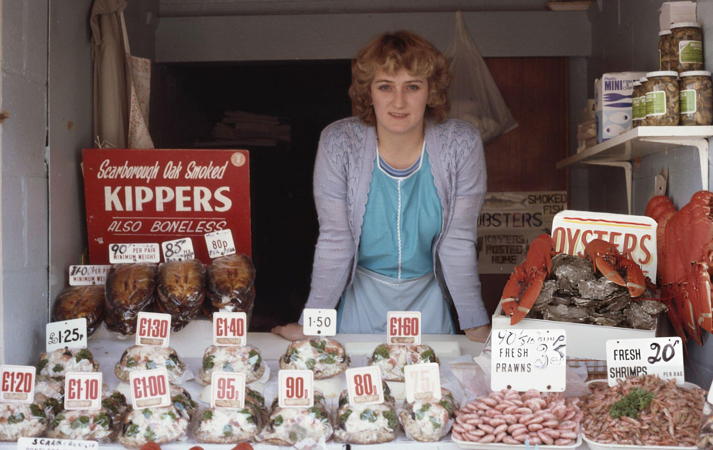 A woman selling fresh seafood in Scarborough, Yorkshire, 1980s.